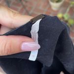 Free People  Black mini romper with tie front and pockets sz M Photo 3