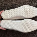 Anthropologie {{all black}} Side Scoop Leather Flats in bone white from Photo 8