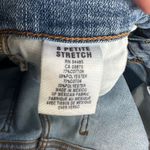 American Eagle  Distressed flared 8 petite jeans Photo 1