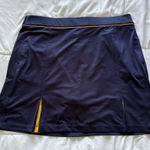 IZOD NWT Golf Skort Skirt Blue Yellow Pull On Stretch Womens Size Large Pockets Photo 0