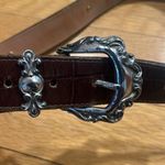 Brighton  1993 dark brown textured silver medallion accents belt size medium. Photo 2