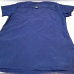 WonderWink scrub top, size Large. This top has two front pockets. Photo 1