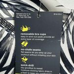 Xersion NWT  Medium-Impact Sports Bra, Black/White Palm Print Photo 5