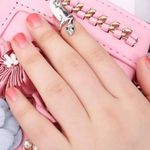 Silver Star Snake Nail Ring Photo 1