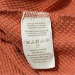 Free People We The  Women’s Size XS Orange Oversized Swing Thermal Waffle Top Photo 4