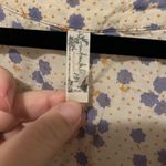 Free People  Floral Bodysuit in Cream and Purple Photo 1