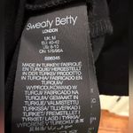 Sweaty Betty  Mellow Midi Dress Sz M Black Asymmetrical Viscose Blend Minimalist Photo 4