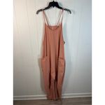 Free People  Movement Hot Shot Jumpsuit in Petal Size L. NWT Photo 2