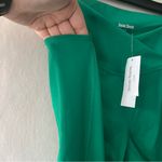 Social Tourist Green Crossover Leggings with Pockets Size Medium NWT Photo 4