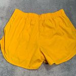 Nike  Women's Vibrant Yellow Athletic Shorts Photo 8