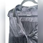 Reformation  Silky Black Button-Up Blouse with White Trim Photo 3