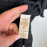 Free People  | Size‎ XS Cold Shoulder Black Asymmetrical Short Sleeve Blouse Photo 4