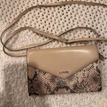 Lodis Tan and Brown Snake Print Women's Crossbody Bag Photo 0