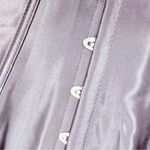 Black sleeveless corset with tie back and clip front as shown shape Photo 1