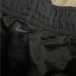 Nike  Women's Black Shorts with Red and White Trim Photo 1