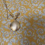 Vintage Sarah Coventry Gold Locket Necklace with Green Gem Photo 2