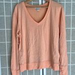 Athleta NWT  Sunrise V neck Sweatshirt Medium peachy orange color thumb holes Photo 3