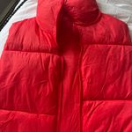 Amazon Red Vest  Photo 1