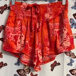 No Boundaries  Vibrant Red and Orange Shorts Photo 0