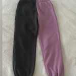 Two tone jogging pants in very good condition. Size M Photo 0
