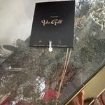 Brandy Melville  MINI CROSS Gold Necklace Photo 2