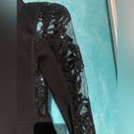 Alyce Paris  x-small elegant black party dress. Long sleeves with open back. Photo 4