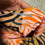 It’s Now Cool x Free People Tiger Print One Piece Swimsuit Photo 5