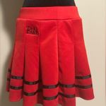 EUC Spencer’s Red and Black B**** Pleated Cheer Skirt size large Photo 0