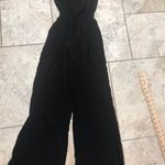Guess  Women’s Black XS Sandra Jumpsuit Solid wide-leg Strapless neckline Photo 1