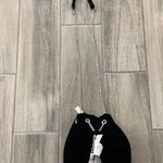 White House | Black Market  tassel bag Photo 0