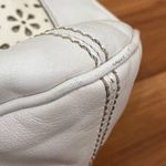 Brighton Perforated Daisy Drawstring Tassel Leather White Shoulder Hobo Bag Photo 14