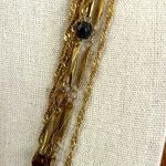 Jessica Simpson 7 strand gold tone statement necklace brown pendant and AB beads Photo 4