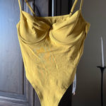 Micas Yellow  body suit. NWT Photo 0