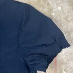 Athleta Levitate Poplin Tee in Black
Size: Small Photo 2