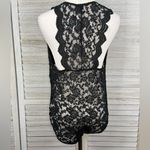 AMBIANCE Plus Size Black Lace Bodysuit Photo 1
