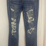 American Eagle  Outfitters Ripped Blue Skinny Jeans Photo 0