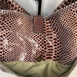 G.I.L.I.Snake Fringe Stirrup Shoulder Red/Brown Patent Suede Bag. Photo 8