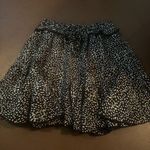 Black and White Mini Skater Skirt with Ruffled Smocked Design Photo 0