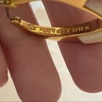 Trina Turk gold tone and white hoop earrings Photo 7