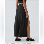 Halara NWT  Black Maxi buckle Skirt- Side Slits. Stretchy size M. Original bag Photo 1