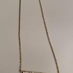 Gold and rhinestone bar necklace Photo 1