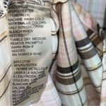 Allison Daley
Pink and brown/Shimmery Gold plaid long sleeve button down shirt Photo 5