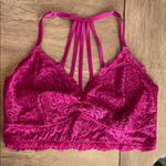 Torrid  strappy back bralette in color berry. Size 1. NWT. Photo 0