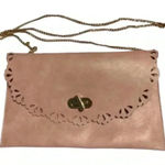 Moda Luxe blush pink leather clutch bag with intricate cut-out… Photo 0