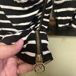 Michael Kors black & white 3/4 sleeve wrapped vneck striped side zipper top Photo 3
