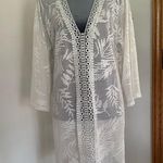 Elegant White Lace Swim Cover Photo 0