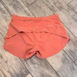 Lululemon  speed up shorts size 8 tall 4”  Photo 2