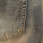 Indigo Rein  medium/light was distressed button front denim mini skirt. Photo 6