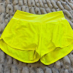 Lululemon  mid rise 4” speed ups Photo 0