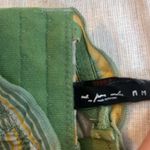 Out From Under Corset Photo 2